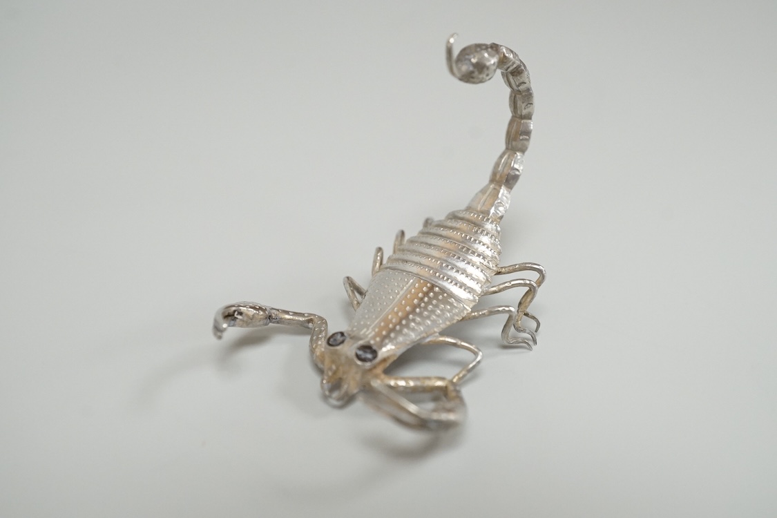 A group of nine assorted Indian white metal miniature model insects and reptiles, etc. including a King Cobra, scorpion, lizards, turtle, butterfly and crab etc.